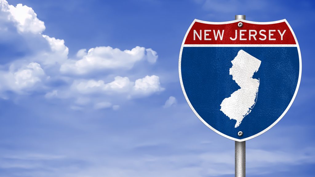 Road sign welcoming people to New Jersey